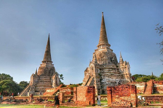 Afternoon Ayutthaya heritage site & River Boat Ride at Sunset - Wat Mahathat: Seeing the Buddha Head in Tree Roots
