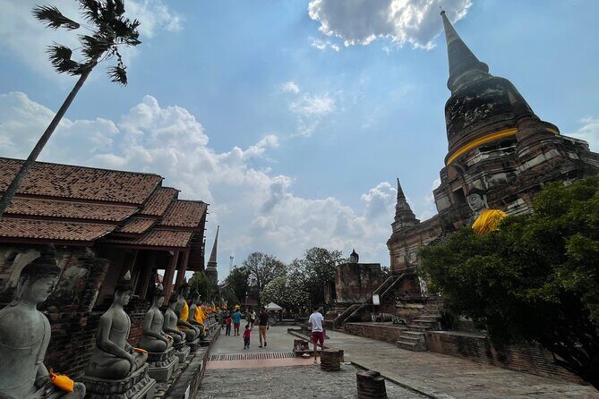 Ayutthaya Historical Old Capital day Tour from Bangkok - Wat Lokaya Sutha: the reclining Buddha moment