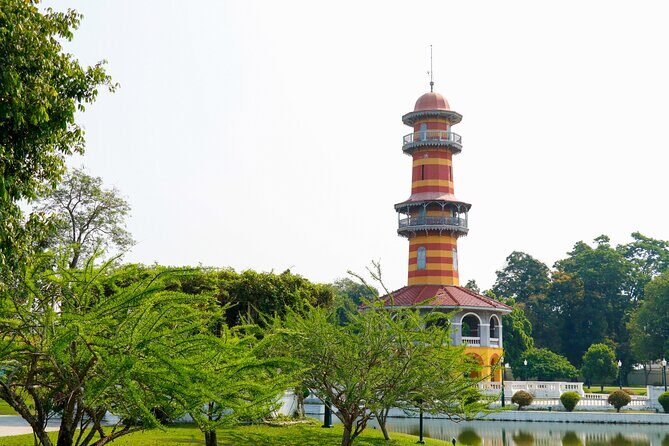 Ayutthaya Summer Palace and Temples Day Tour from Bangkok - Wat Mahathat and the Buddha Head in Tree Roots