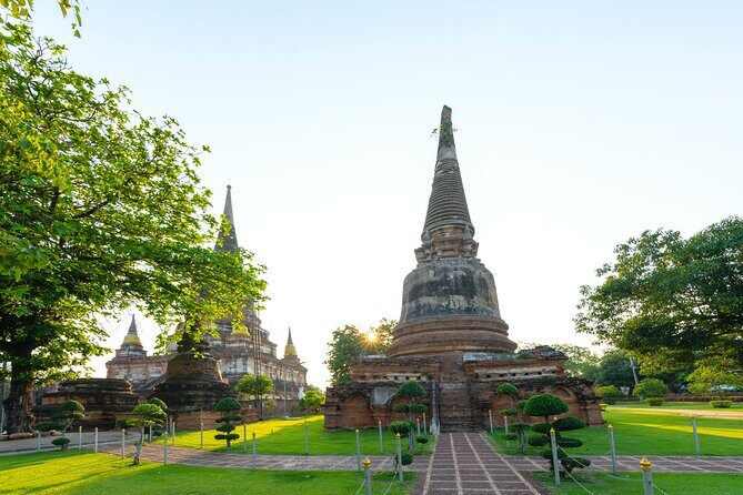 Ayutthaya Sunset Join Tour, Boat Ride, Famous Spot & Local Market - Temple Circuit Part 2: Wat Yai Chaya Mongkol’s prang and skyline views