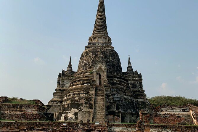 Ayutthaya Sunset Join Tour, Boat Ride, Famous Spot & Local Market - Temple Circuit Part 1: Wat Mahathat and the relic story