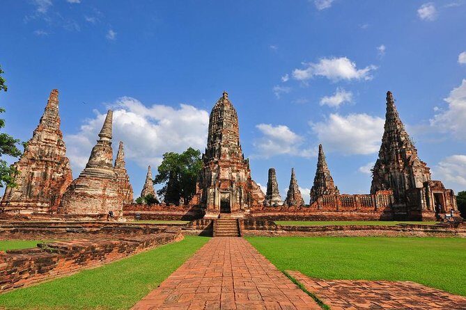 Bangkok: Private Ayutthaya and Bang Pa-In Summer Palace Tour - Wat Mahathat: the tree-root Buddha and the story behind the ruins