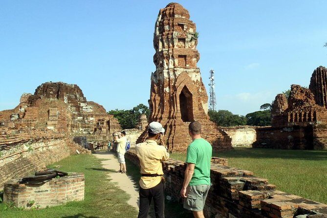 Colors of Ayutthaya Full-Day Bike Tour - Wat Lokayasutharam: a massive restored reclining Buddha ruin