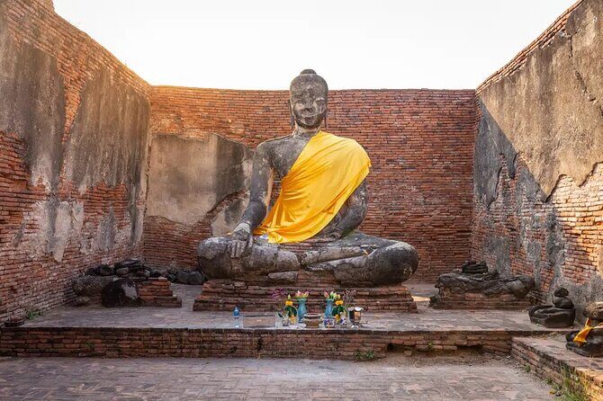 Day Tour of Ayutthaya and Bang Pa-In - Stop 3: Wat Mahathat and the Tree Buddha moment