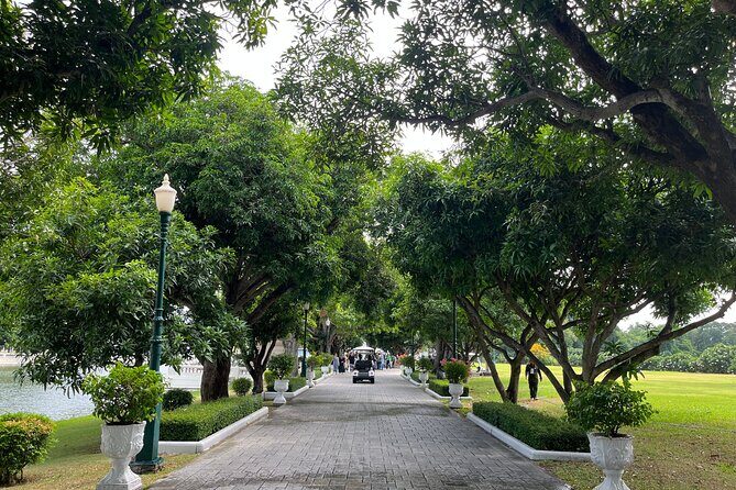 Explore Ancient Ayutthaya Historical Park Day Tour in Bangkok - Wat Yai Chaimongkul: reclining Buddha, towering chedi, and an active monastery