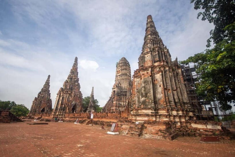 From Bangkok: Affordable Ayutthaya Highlights Tour - Wat Maha That: The Buddha Head Wrapped in Tree Roots