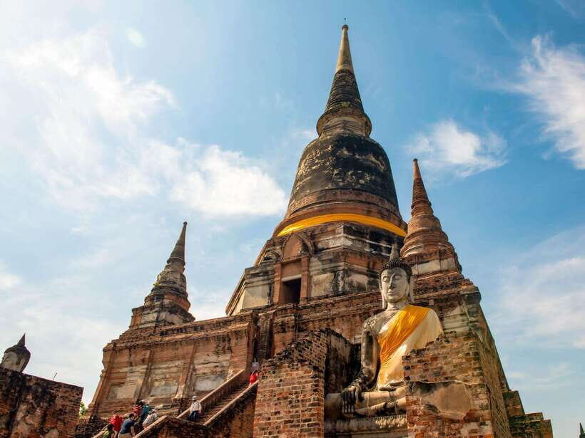 From Bangkok: Ayutthaya Historical Park Guided Day Trip - Wat Mahathat: the Buddha head in tree roots (and the scars of war)