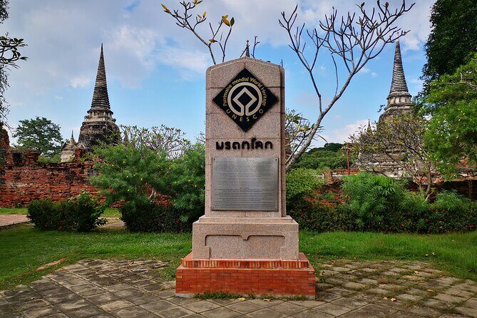 Private Excursion to Ayutthaya, UNESCO World Heritage site with Boat Tour - Wat Mahathat: the tree-root moment you came for